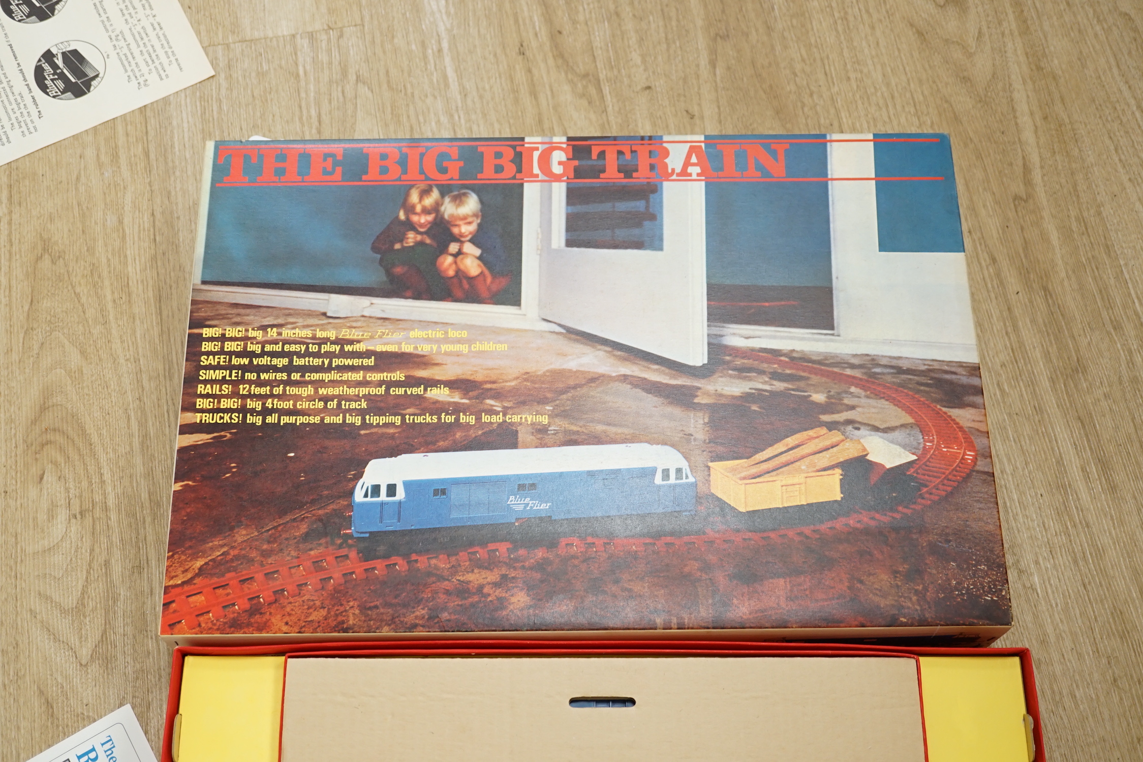 Three Tri-ang The Big Big Train 0 gauge train sets, all with a ‘Blue Flyer’ diesel locomotive and rolling stock, track sections, etc.